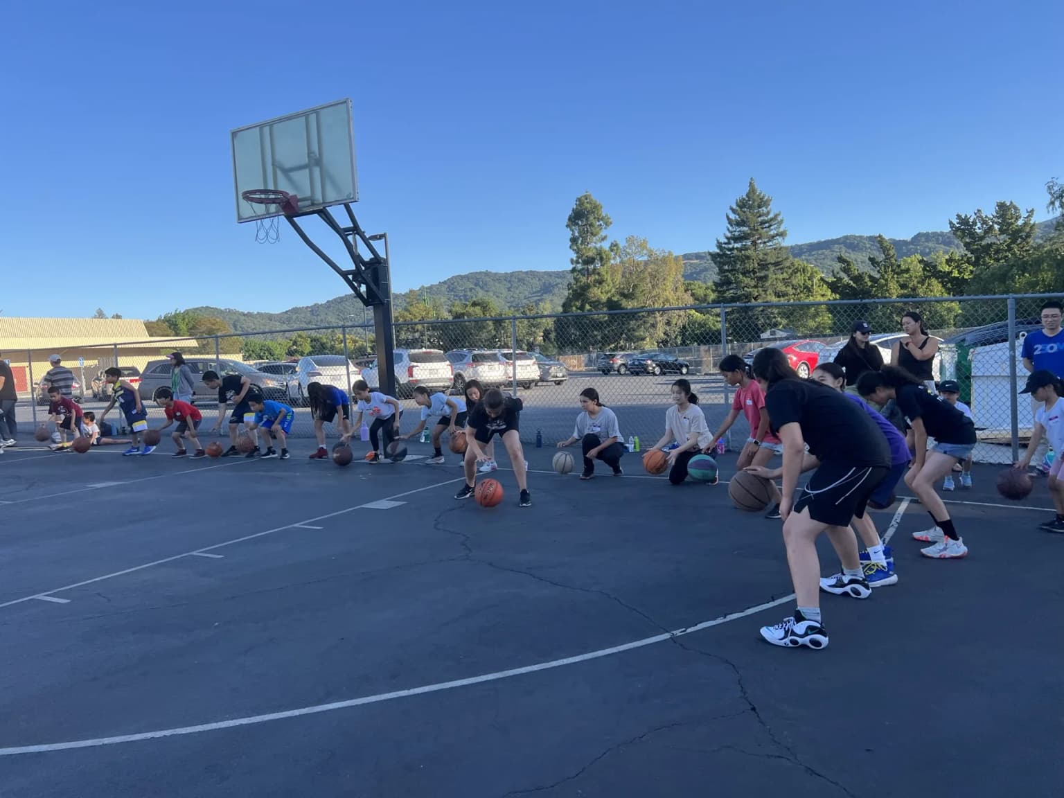 Players warming up on the outdoor court.